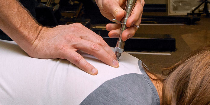 patient getting activator methods as an auto accident injury treatment in Pompano Beach
